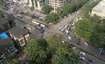 Vashi Sector 1_a city street filled with lots of parked cars